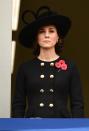<p>Kate wore a black Dolce & Gabbana coat dress to the somber Remembrance Day ceremony, which honors fallen soldiers. She paired the chic black outfit with a black hat, <a href="https://www.townandcountrymag.com/leisure/arts-and-culture/a10392338/what-is-remembrance-day-and-poppy-pin-badges/" rel="nofollow noopener" target="_blank" data-ylk="slk:a poppy pin;elm:context_link;itc:0;sec:content-canvas" class="link ">a poppy pin</a>, and a new short hairstyle, which was later revealed <a href="https://www.townandcountrymag.com/society/tradition/g12167293/kate-middleton-best-maternity-outfits/" rel="nofollow noopener" target="_blank" data-ylk="slk:to be a faux-bob;elm:context_link;itc:0;sec:content-canvas" class="link ">to be a faux-bob</a>.</p>