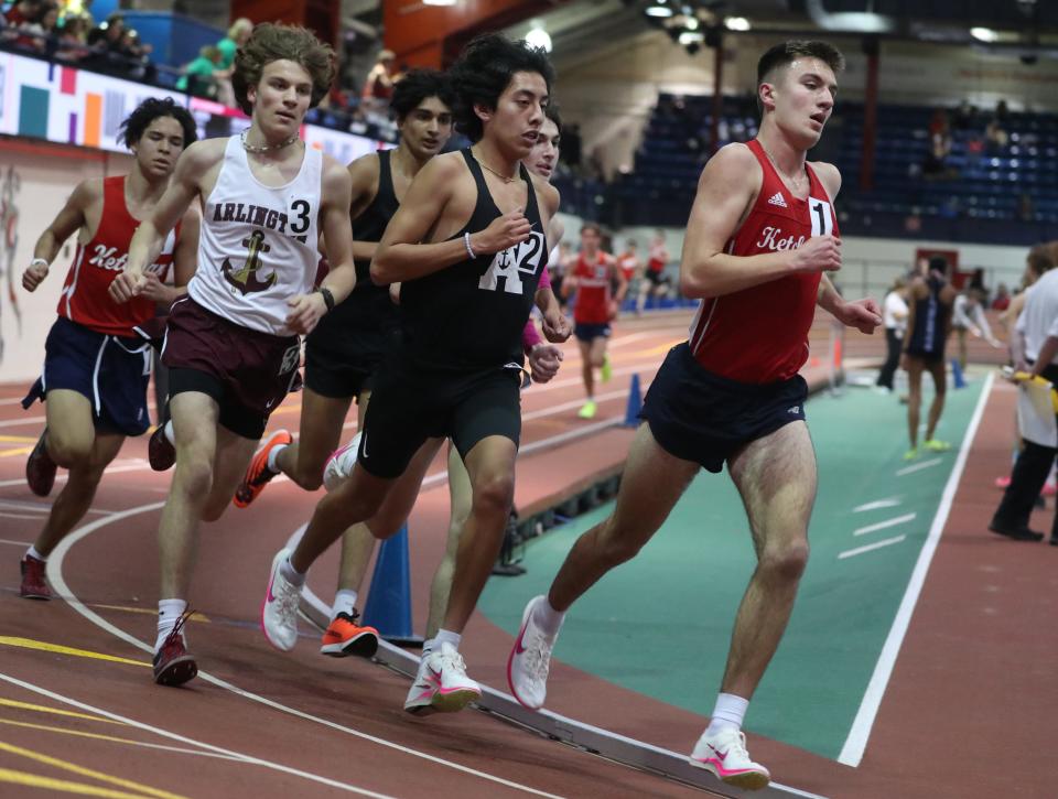 RC Ketcham's Connor Hitt, right, won the Rockland County 3200-meter run at the Rockland and Northern Counties track and field championships at the Armory Jan. 26, 2024.