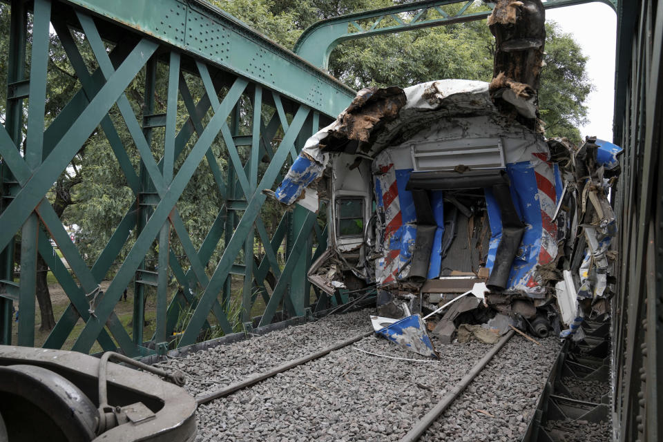 A train wagon that collided with another stands on the rails in Buenos Aires, Argentina, Friday, May 10, 2024. (AP Photo/Rodrigo Abd)