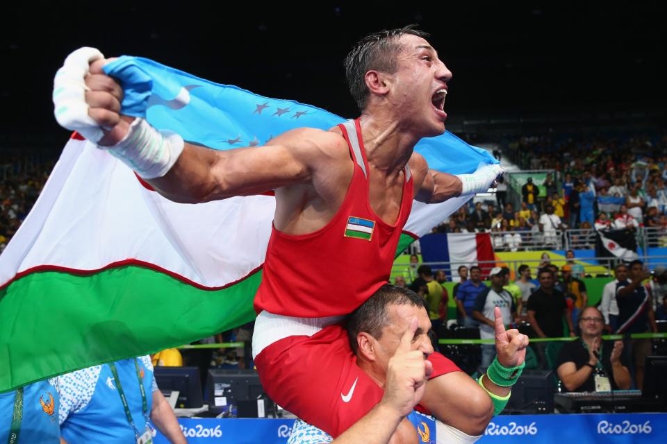 <p>Fazliddin Gaibnazarov of Uzbekistan celebrates victory over Lorenzo Sotomayor Collazo of Azerbaijan in the Men’s Light Welter (64kg) Final Bout on Day 16 of the Rio 2016 Olympic Games at Riocentro – Pavilion 6 on August 21, 2016 in Rio de Janeiro, Brazil. (Getty) </p>