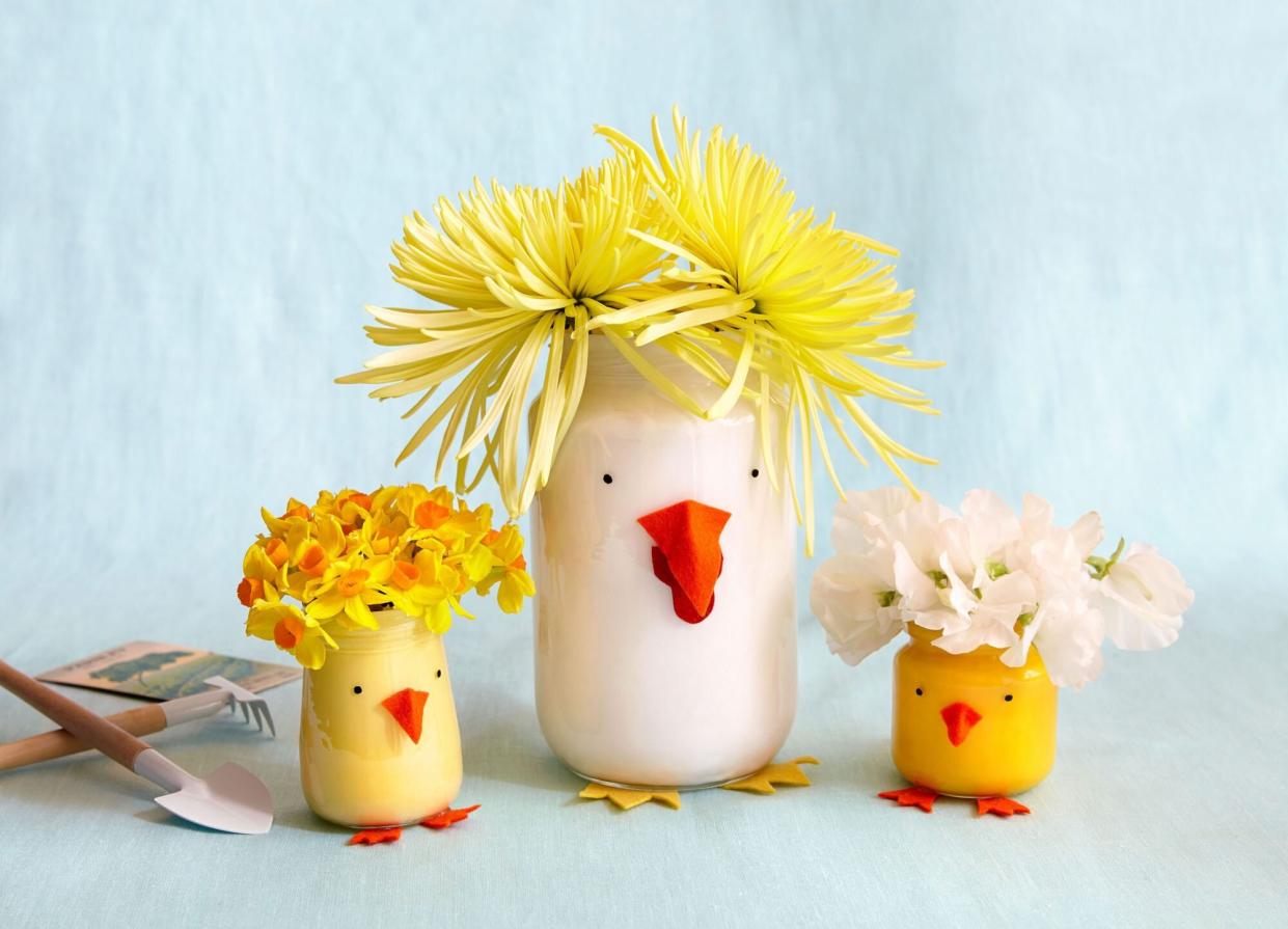 large white chicken little jar and two small yellow chicken little jars