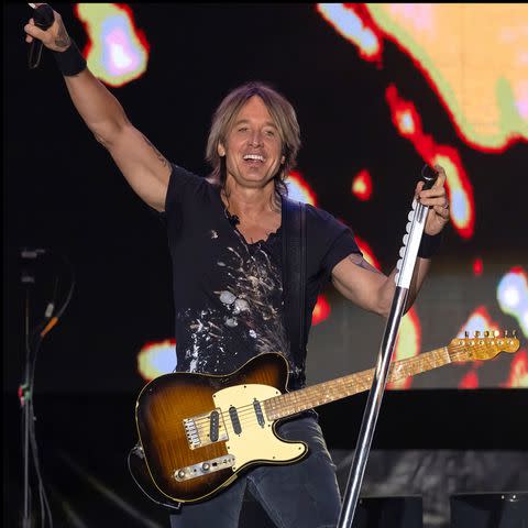 <p>Daniel DeSlover/Zuma / SplashNews.com</p> Keith Urban performs in Wisconsin in July 2023