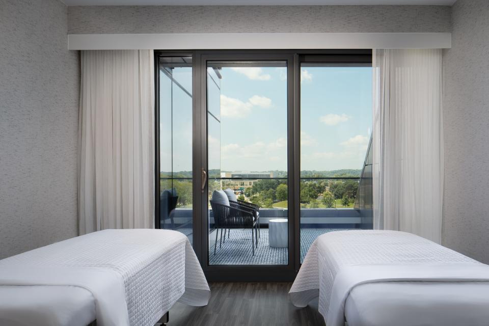 Private spa rooms overlook the city of Grand Rapids and the Grand River.