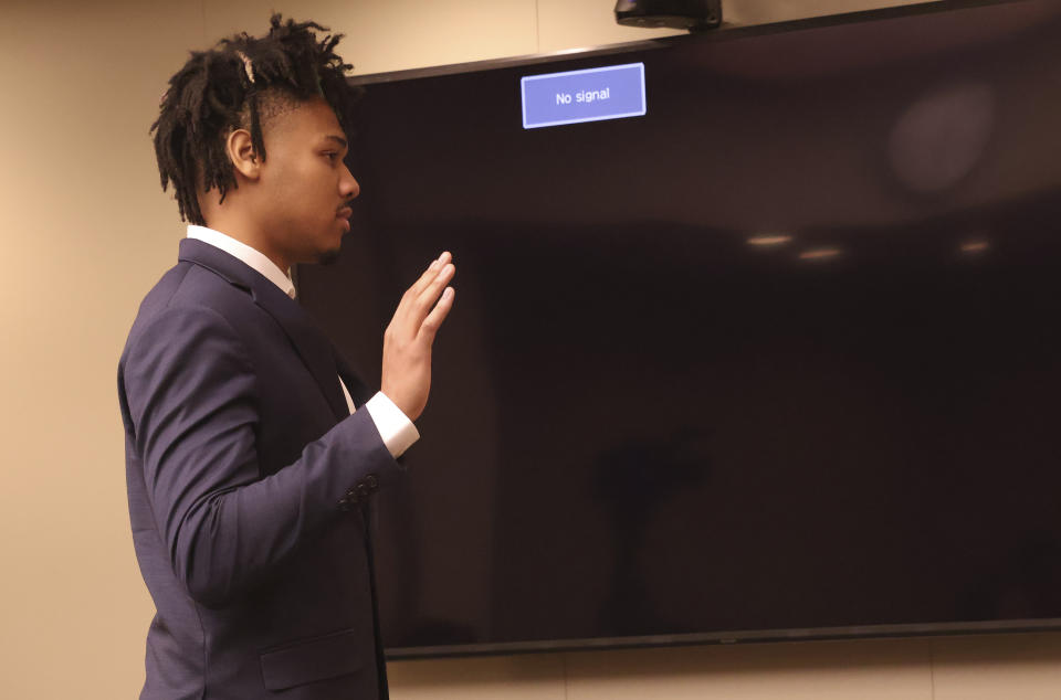 University of Illinois basketball standout Terrence Shannon Jr. is sworn in before testifying during his trial Thursday June 13, 2024, in Lawrence, Kan. Shannon, of Champaign, Ill., is accused of committing sexual assault on Sept. 9, 2023, in Lawrence, Kan. (Chris Conde/The Lawrence Journal-World via AP)