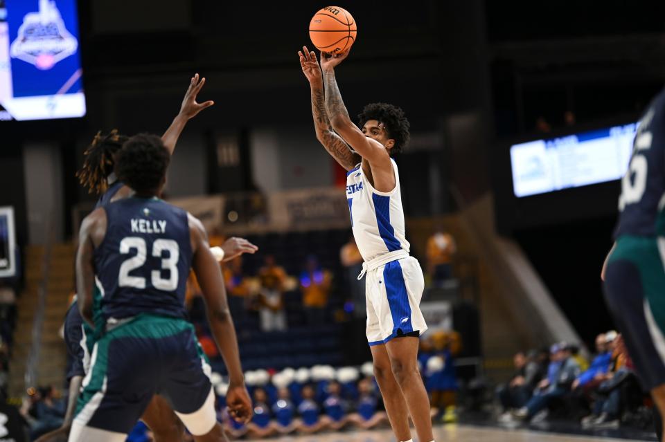 Mar 6, 2023; Washington, D.C., USA;  Hofstra Pride guard Aaron Estrada (1) shoots a three point shot during the first half North Carolina-Wilmington Seahawks of CAA Tournament Semifinals at Entertainment & Sports Arena. Mandatory Credit: Tommy Gilligan-USA TODAY Sports