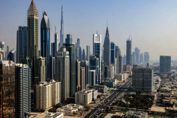 High-rises in Dubai: UAE plans to triple renewable energy production and cut emissions (Karim SAHIB)