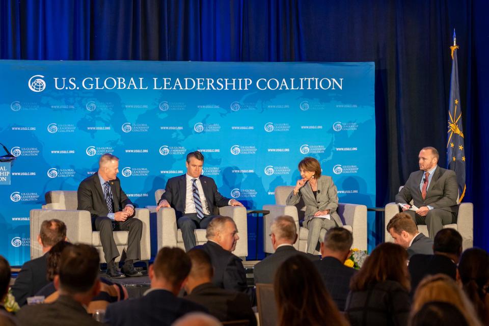 Indiana Sen. Todd Young, second from left, spoke at a panel Monday, Oct. 30, about America's positioning in the face of global conflict, hosted by the U.S. Global Leadership Coalition. From left: Lt. Gen. Thomas S. James, Jr.; Young; USGLC President Liz Schrayer; and Justin Rismiller of Cargill.