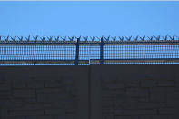 <p>The top of one of President Donald Trump’s eight border wall prototypes is pictured along U.S.- Mexico border near San Diego, Calif., Oct. 23, 2017. (Photo: Mike Blake/Reuters) </p>