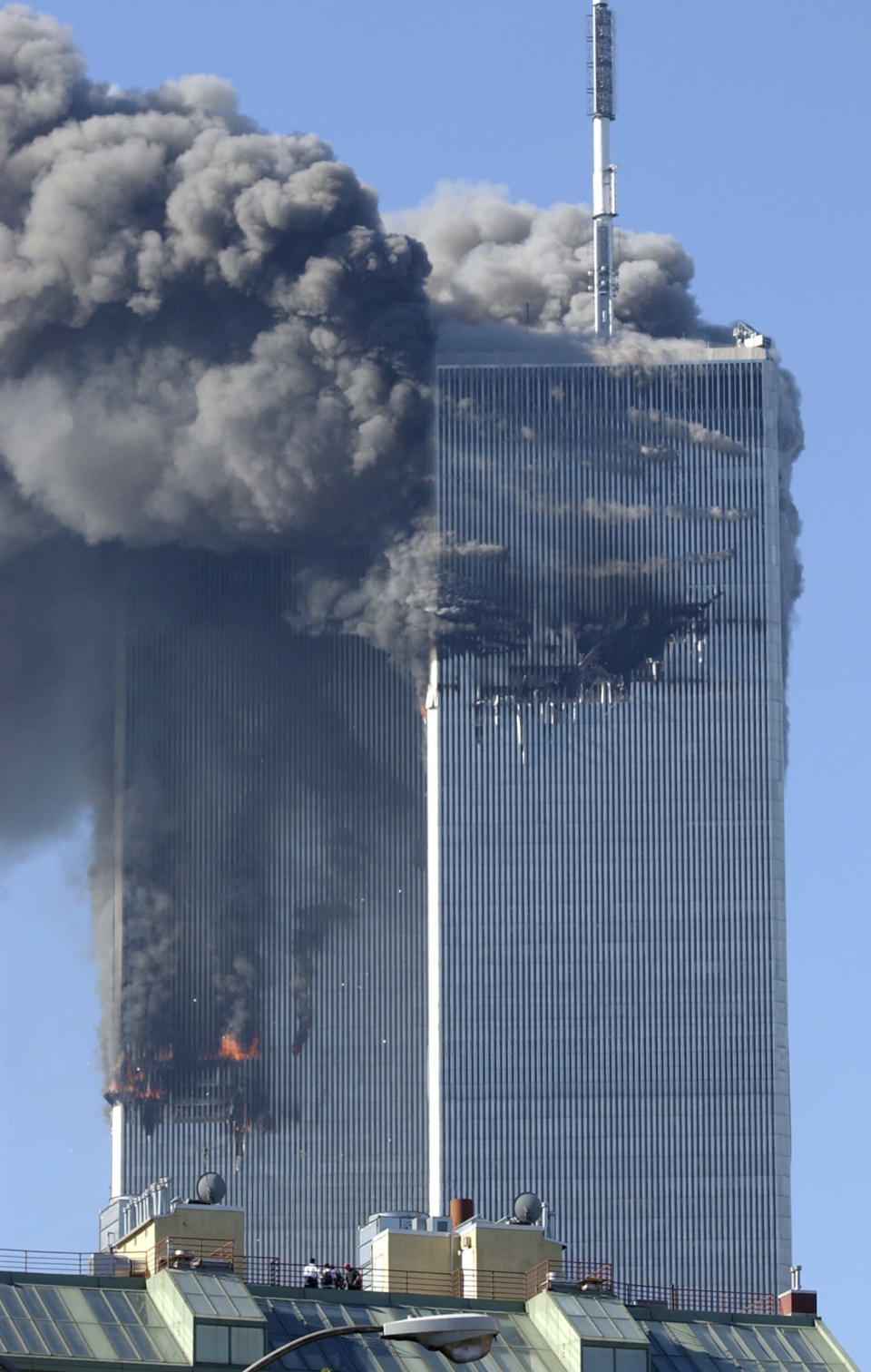 Smoke billows from the North and South Towers of the World Trade Center before they collapsed on September 11, 2001 in New York, NY. (AP Photo/Amy Sancetta)