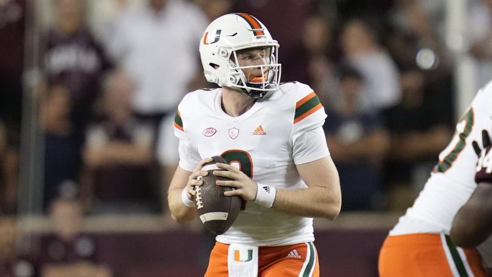 Miami quarterback Tyler Van Dyke (9) looks to pass downfield against Texas A&M during the first quarter of an NCAA college football game Saturday, Sept. 17, 2022, in College Station, Texas. (AP Photo/Sam Craft)