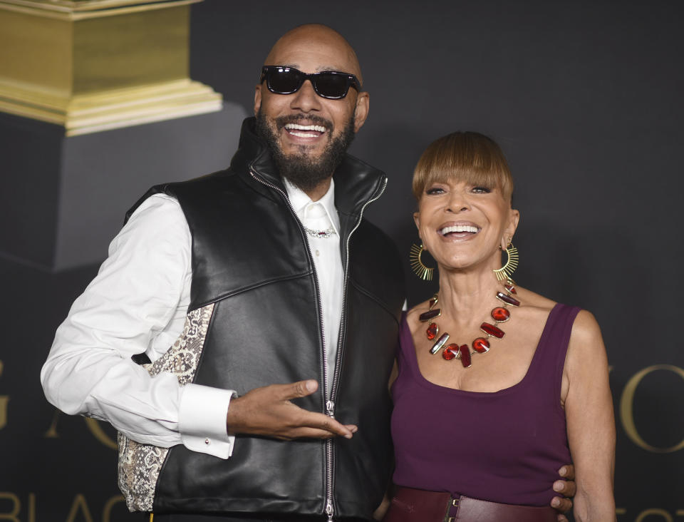 Swizz Beatz, left, and Epic Records CEO Sylvia Rhone arrive at the Black Music Collective on Thursday, Feb. 2, 2023, at The Hollywood Palladium in Los Angeles. (Photo by Richard Shotwell/Invision/AP)