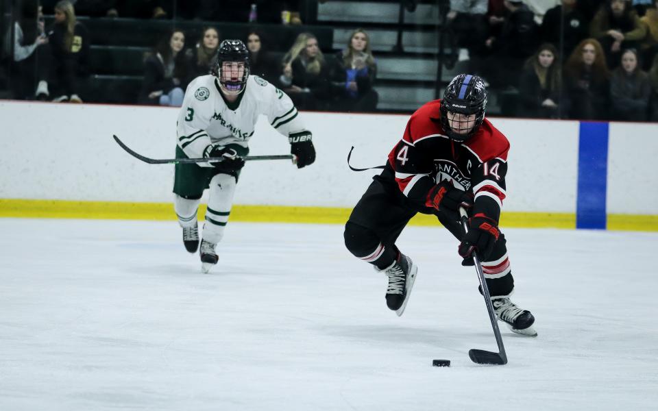 Whitman-Hanson's Luke Tropeano fires a shot during a game against Marshfield at The Bog in Kingston on Saturday, Feb. 18, 2023.