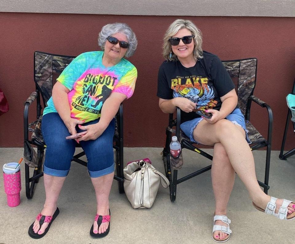 Blake Shelton fans, from left, Lanell Eclair and Jamie McGaugh, of Coalgate, wait in line Aug. 11 outside Ole Red Tishomingo, Blake Shelton's restaurant, bar and music venue. Along with Shelton, the country music superstar's wife, pop icon Gwen Stefani, and her oldest son, Kingston Rossdale, performed that night at Ole Red Tishomingo.