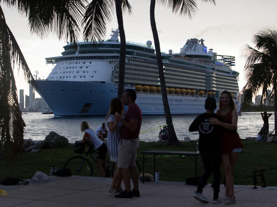 The Royal Caribbean Freedom of the Seas gets underway through the Government Cut shipping channel at PortMiami during the first U.S. trial cruise testing COVID-19 protocols on June 20, 2021 in Miami, Florida.