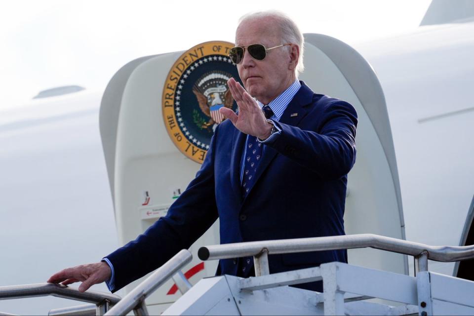 President Joe Biden waves as he arrives on Air Force One at Westchester County Airport in White Plains, New York, on Monday 3 June 2024 (Alex Brandon/AP)