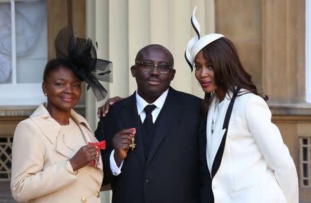 Model Naomi Campbell (R) poses for a photograph with Baroness Amos (L) and fashion stylist Edward Enninful, after Amos received her Member of the Order of the Companions of Honour, and Enninful his Officer of the Order of the British Empire (OBE), at Buckingham Palace in London, Britain October 27, 2016. REUTERS/Philip Toscano/Pool