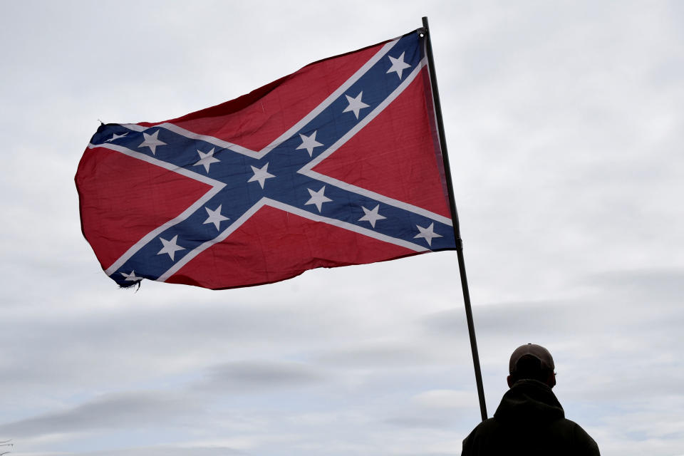 Trevor Jackson displays a Confederate flag during a rally held by Sons of Confederate Veterans in Shawnee, Oklahoma, U.S. March 4, 2017. (Photo: Nick Oxford / Reuters)