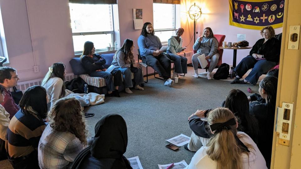 A group of Augustana University students gather during a "Chai and Chat" event to discuss Native American religions on Friday, March 1, 2024, in the interfaith room at Morrison Commons Building on campus.