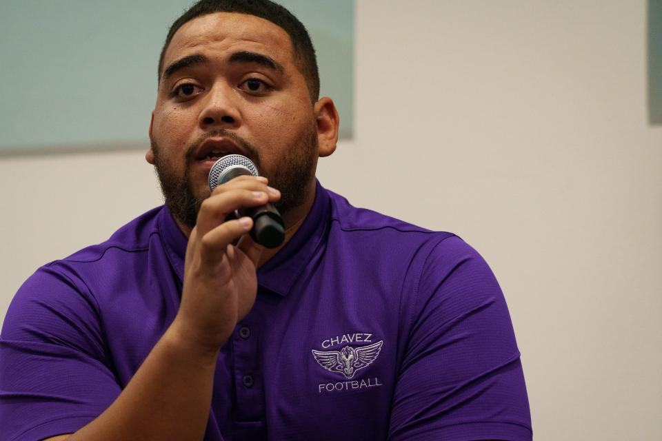 Cesar Chavez coach William Burwell Jr. speaks at Phoenix Union High School District Football Media Day at the district building in Phoenix on Aug. 21, 2023.