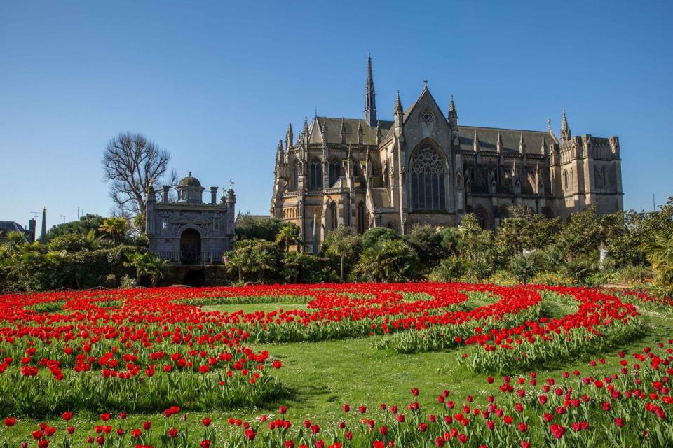 <p>If you're looking for a garden to truly surprise you, <a href="https://www.arundelcastle.org/" rel="nofollow noopener" target="_blank" data-ylk="slk:Arundel Castle;elm:context_link;itc:0;sec:content-canvas" class="link ">Arundel Castle</a> is the place to visit. It's home to a variety of landscapes and environments, from the quirky Stumpery to the formal Collector Earl’s garden to the warmth of the Glasshouses.</p><p>Here, you'll be wowed by the explosions of colour, delicate scents and structural designs. Immerse yourself in the fragrance of the Rose Garden and enjoy the peace and tranquility of the Fitzalan Chapel's White Garden.</p><p><strong>How to visit </strong><br></p><p>Discover Arundel Castle's epic garden during a mini-break near Arundel, where you can check into a hotel, apartment or cosy holiday home.</p><p><a class="link " href="https://www.booking.com/landmark/gb/arundel-castle.en-gb.html?aid=2070935&label=beautiful-uk-gardens" rel="nofollow noopener" target="_blank" data-ylk="slk:PLACES TO STAY NEAR ARUNDEL CASTLE;elm:context_link;itc:0;sec:content-canvas">PLACES TO STAY NEAR ARUNDEL CASTLE </a></p>