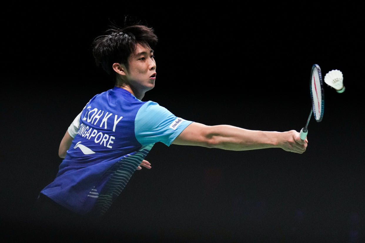 Singapore shuttler Loh Kean Yew retrieves a shot at the Denmark Open. 