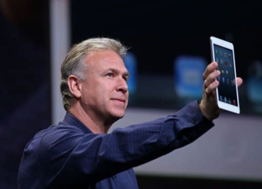 Apple Senior Vice President of Worldwide Marketing Phil Schiller announces the iPad Mini during Apple's special event at the California Theatre in San Jose, California. Apple introduced the iPad mini, confident that a smaller version of its beloved tablet computer will trump lower-priced offerings by rivals Amazon, Google and Samsung