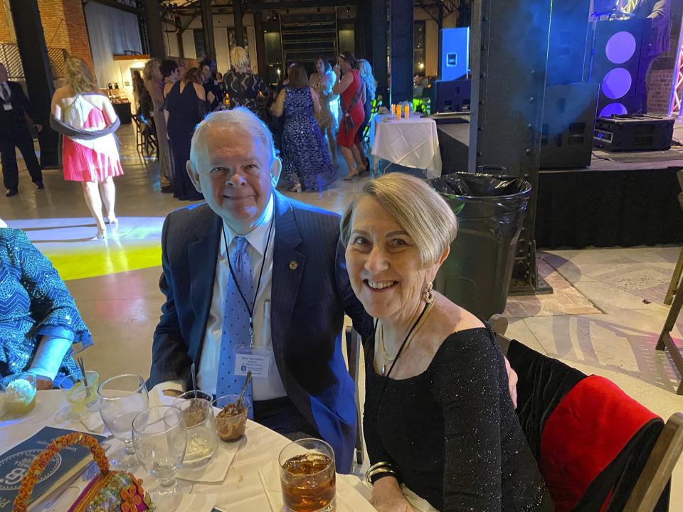 This photo shows Don and Margie Varnadoe attending a March 2021 awards banquet in Savannah, Ga., for the real estate office where Don Varnadoe worked. The husband and wife from St. Simons Island, Ga.,were among three people killed when an Amtrak train derailed in Montana on Saturday, Sept. 25, 2021. (Photo courtesy of Robert Kozlowski via AP)