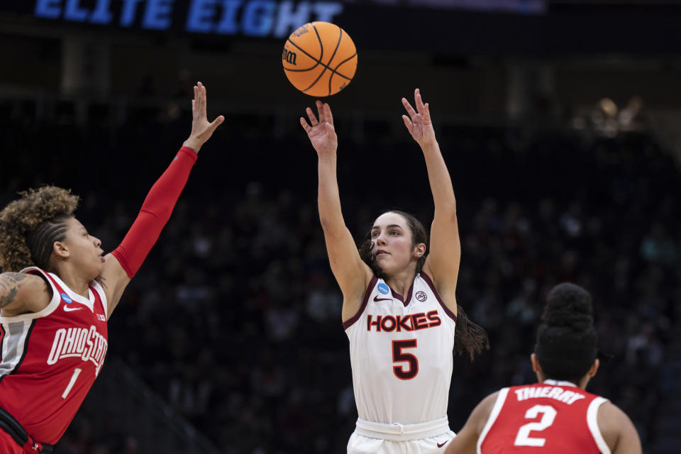 Virginia Tech guard Georgia Amoore (5) shoots over Ohio State guard Rikki Harris during the first half of an Elite 8 college basketball game of the NCAA Tournament, Monday, March 27, 2023, in Seattle. (AP Photo/Stephen Brashear)