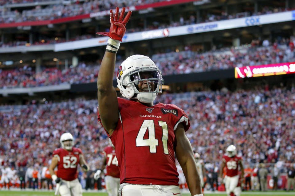 Arizona Cardinals running back Kenyan Drake (41) motions after his fourth touchdown of the game during the second half of an NFL football game against the Cleveland Browns, Sunday, Dec. 15, 2019, in Glendale, Ariz. (AP Photo/Ross D. Franklin)