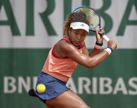 May 28, 2018, Paris, France; Naomi Osaka (JPN) in action during her match against Sophia Kenin (USA) on day two of the 2018 French Open at Roland Garros. Mandatory Credit: Susan Mullane-USA TODAY Sports