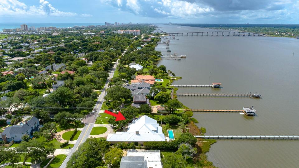 Located on the highly coveted 300 block of prestigious John Anderson Drive in Ormond Beach, this beauty boasts nearly 5,000 square feet of living space and a dock on the Intracoastal Waterway.