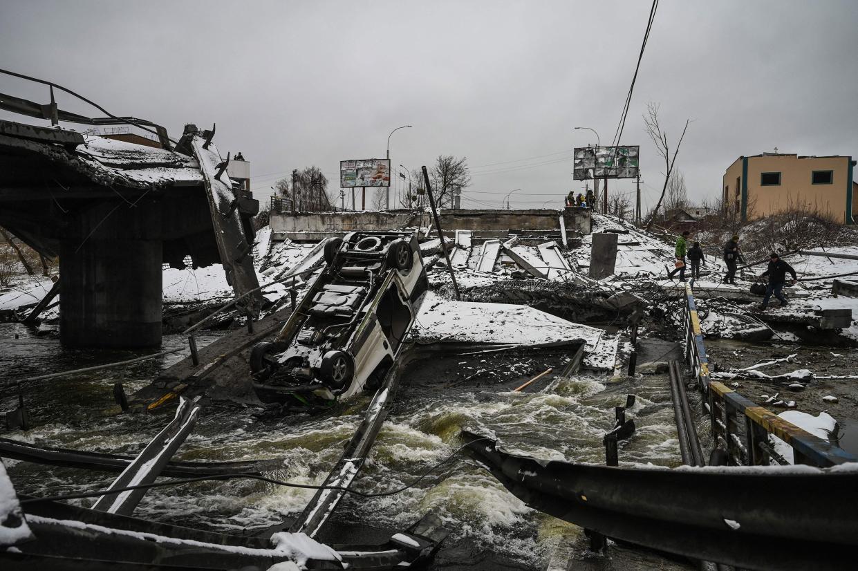 A blown up bridge is seen on Kyiv's northern front on March 1, 2022. Defending capital Kyiv is the "key priority," Ukrainian president said.