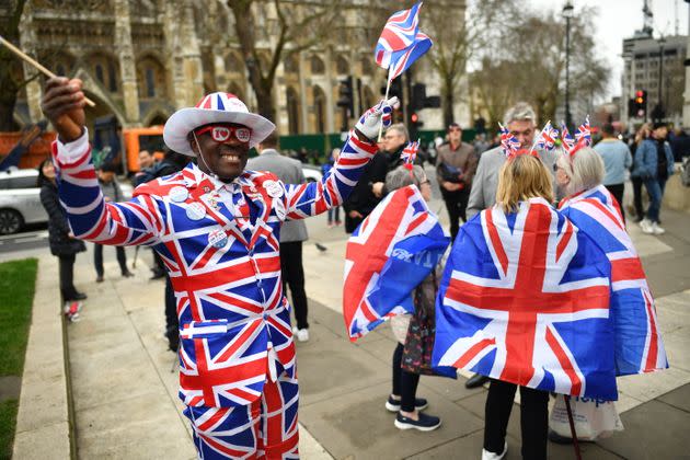 A man poses in a Union Jack suit at Parliament Square as people prepare for Brexit on January 31, 2020 in London (Photo: Jeff J Mitchell via Getty Images)