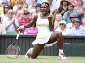 FILE - In this July 3, 2010, file photo, Serena Williams celebrates winning a point against Russia's Vera Zvonareva during their women's singles final at the All England Lawn Tennis Championships at Wimbledon. \Serena Williams says she is ready to step away from tennis after winning 23 Grand Slam titles, turning her focus to having another child and her business interests. “I’m turning 41 this month, and something’s got to give,” Williams wrote in an essay released Tuesday, Aug. 9, 2022, by Vogue magazine. (AP Photo/Alastair Grant, File)