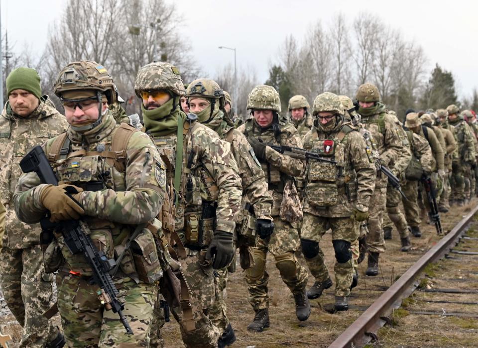 The Ukrainian Territorial Defence Forces, the military reserve of the Ukrainian Armed Forces, take part in a military drill outside Kyiv on February 19, 2022.
