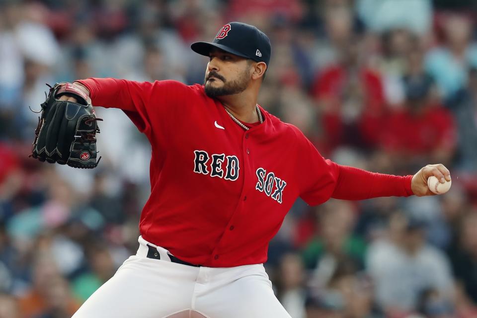 Boston Red Sox's Martin Perez pitches during the first inning of a baseball game against the New York Yankees, Friday, June 25, 2021, in Boston. (AP Photo/Michael Dwyer)