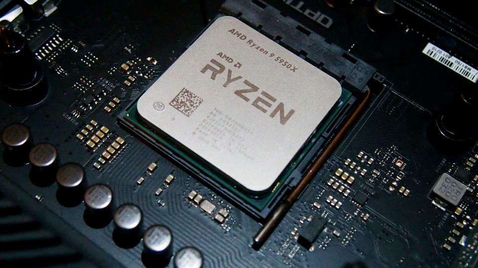 An AMD Ryzen 9 5950X CPU in an AM4 socket on the motherboard