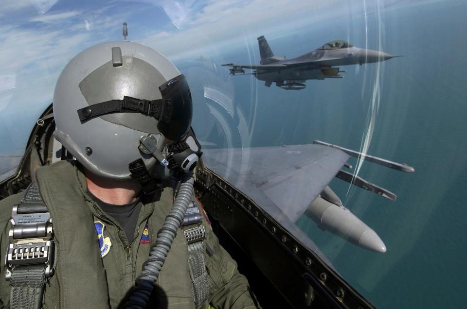 F-16 Fighting Falcons from the 62nd Fighter Squadron, Luke Air Force Base, Ariz., fly over southern Florida during a flight from Luke to Key West, Fla., Oct. 16, 2004.