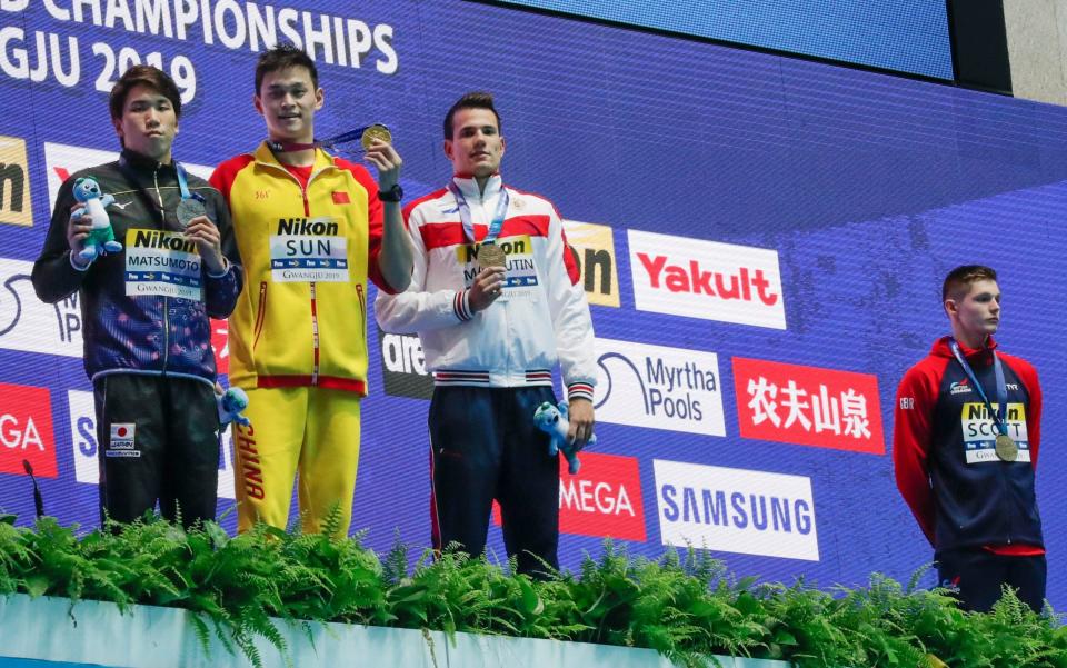 Britain’s Duncan Scott refuses to stand with drug cheat Sun Yang at last summer’s World Aquatics Championships - AP