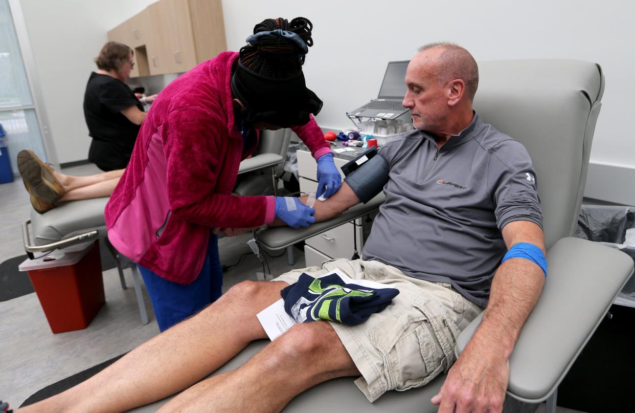 Jim Archambault of Edwardsburg donates blood Wednesday, Sept. 20, 2023, at the South Bend Medical Foundation Blood Donor Center in Mishawaka. He has been donating for five or six years.