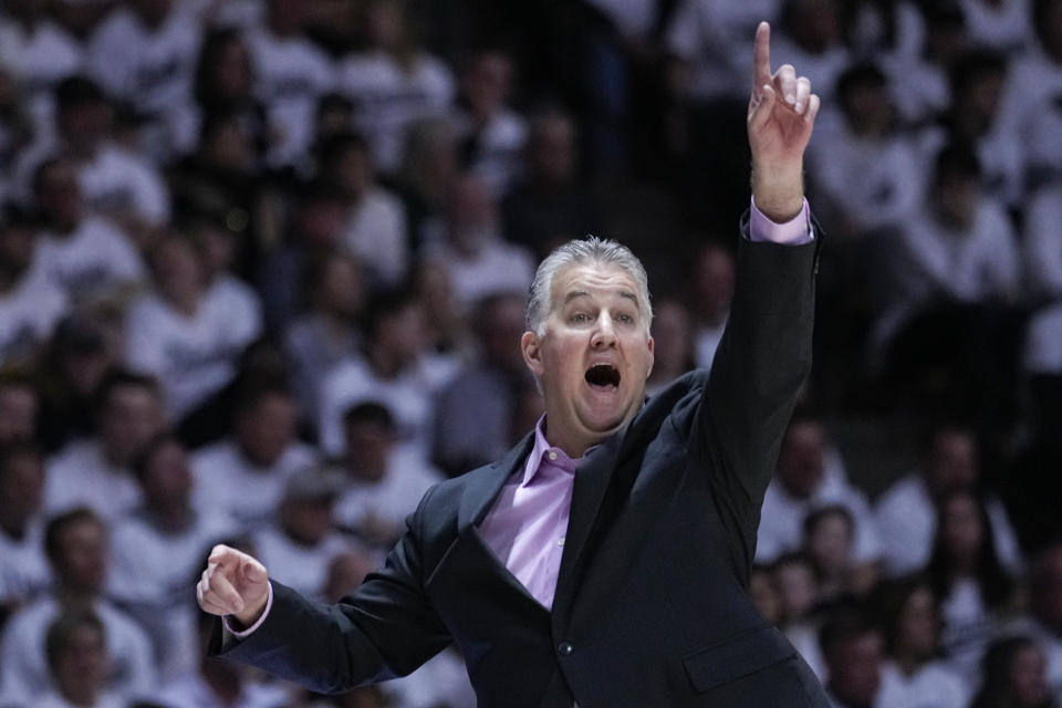 Purdue head coach Matt Painter gestures on the sideline during the second half of an NCAA college basketball game against Michigan State in West Lafayette, Ind., Sunday, Jan. 29, 2023. Purdue defeated Michigan State 77-61. (AP Photo/Michael Conroy)