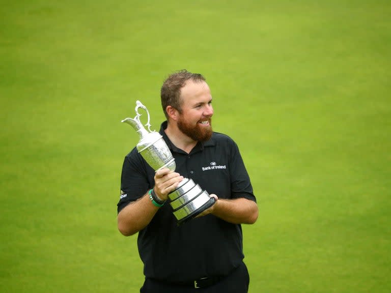 “Today, there is not a Northern Ireland and an Ireland,” an emotional Graeme McDowell said after his final round. “Shane [Lowry] has united us all.”As night time fell over Portrush, bleary fans flocked back across the border, scoreboards and supersized tents were crumbled into cargo to be shipped across the Irish Sea, the cramped B&Bs emptied and the hoard of hungry taxi drivers made their final hour-long journey home to Belfast.After waiting 68 years for The Open to return to these parts, the tournament was over in the blink of an eye as the rain cleared the pandemonium from the night before and the town returned to its isolated seaside normality. What, though, will become of the Irish unity that flourished over the weekend?In the Harbour Bar, two strangers sat in the bar in the town harbour praising Belfast boxer Carl Frampton – a unionist married to a republican – and it was only a small snippet into the conversations being had between those raised in the royal town and those who had arrived in Sunday’s early hours armed with hope and tricolour flags.Of course, the harmony that encompassed Ireland will slowly give way to the fractious discord fuelled by Brexit and the looming uncertainty over the border. This is, ultimately, a society that will always be ideologically divided and sport cannot rewrite that. But, as the late hours of Sunday evening bled into Monday morning, there was a warm feeling in the air that stretched from this small corner of North Antrim.This Open Championship was one of life’s rare occasions where such trying efforts, from the committee at Portrush, to the R&A and the politicians who set aside deep divisions to help finance the tournament, were perfectly rewarded. Even the great flood that washed over Sunday, sweeping away all but Lowry, only heightened the fever amongst those lining the fairways in transparent blue bin-bags.Lowry is a humble hero whom every person across the country can find cause to cheer. A relatable, dry character who grew up in a town of little over 3,000 people in the Irish midlands. His show of resilience on a tidal final day, where raptures of wind laid waste to the day’s late starters as JB Holmes carded the worst final round in an Open since the ‘60s, was in many ways as brilliant as the course record 63 he ripped through on Saturday.Some things cannot be calculated by mere birdies and bogeys. On a week where fans oozed over the promise of hometown heroes – Rory McIlroy, Graeme McDowell and Darren Clarke – it felt far more significant that it was, in fact, the lovable rogue from the Republic who united a baying and boisterous gallery from first tee to last. Whose first words to the wall of noise behind the green were “this is for you” and bore no north or south and reverberated with an echo beyond any local glory.But the road to this triumph has been far from easy. Only a year ago Lowry had sat in the car park at Carnoustie weeping after a dismal first-round left him feeling disconsolate. On the eve of this tournament, he sat in the nearby Bushmills Inn soul-searching and disillusioned again. And, after his blistering third round, he lay in bed with wide-eyes reminiscing about how he had squandered the same advantage at the US Open three years ago. So when McDowell – born just minutes from here – and Padraig Harrington – a Dubliner through and through – waited beside the 18th green to congratulate him, it was symbolic of Lowry’s own muddied path to semi-deity.Little moments such as those and all which followed into the night will survive even after The Open has long departed. Lowry has written himself amongst the greats of this unthinkable era of Irish golf. In Portrush, the tournament’s legacy will be one that shined a light on North Antrim and reflected across the country.Those who nurtured the farfetched dream of this event and began the decade-long process to make it happen knew what a momentous impact the Major could have. To everyone else, it lived up to so much more than imagination.And, no matter how brief, a unity was forged and resonated here in a way sport has rarely ever managed. With the Claret Jug in one hand and a pint in the other, Lowry was seen celebrating long into the night. As McDowell said, “to have an Irishman on top of the leaderboard made it extra, extra special”.