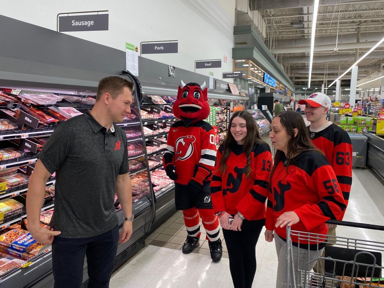 Air Force Senior Master Sgt. Ayshah Tual and her two children with New Jersey Devils Forward Curtis Lazar and the NJ Devils mascot. Tual received a $500 shopping spree at the Clifton Stop & Shop on May 13th for Military Appreciation Month.