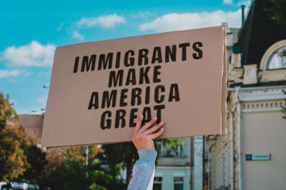 A sign saying, "Immigrants make America great"