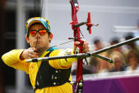 LONDON, ENGLAND - AUGUST 01: Taylor Worth of Australia competes in his Men's Individual Archery 1/16 Eliminations match against Brady Ellison of United States during the Men's Individual Archery on Day 5 of the London 2012 Olympic Games at Lord's Cricket Ground on August 1, 2012 in London, England. (Photo by Paul Gilham/Getty Images)