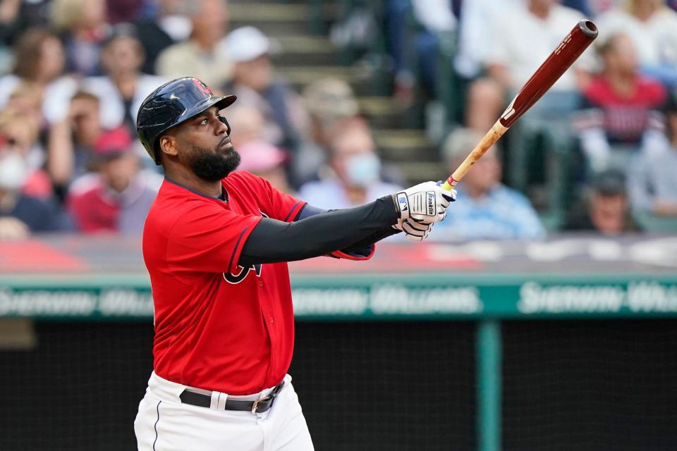 Cleveland's Franmil Reyes watches his two-run home run during the third inning of the team's baseball game against the Minnesota Twins, Thursday, Sept. 9, 2021, in Cleveland. (AP Photo/Tony Dejak)