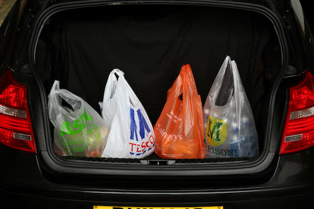 General view of Shopping bags from the four major supermarkets Asda, Tesco, Sainsbury's and Morrisons, in a car boot in Cambridge. PRESS ASSOCIATION Photo. Picture date:Wednesday October 2, 2013. See PA story. Photo credit should read: Chris Radburn/PA Wire