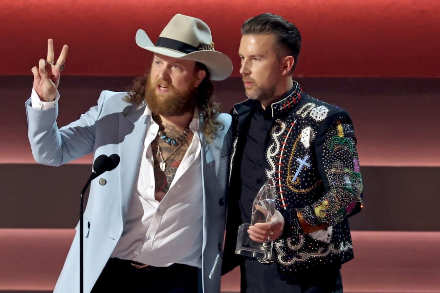 (L-R) John Osborne and T.J. Osborne of The Brothers Osborne accept the Vocal Duo of the Year award onstage during the 57th Annual CMA Awards at Bridgestone Arena on November 08, 2023 in Nashville, Tennessee. (Photo by Terry Wyatt/Getty Images)