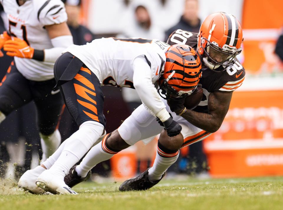 Former Mainland star Ricardo Allen (37) tackles Cleveland Browns' wide receiver Jarvis Landry (80) during the second quarter of the regular-season finale.