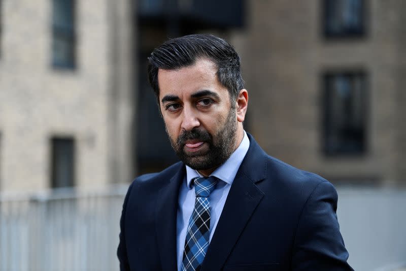 Scotland's First Minister Humza Yousaf visits a housing development in Dundee